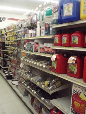 Automotive aisle; gas cans, ball hitches, bondo